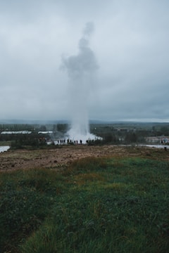 A close-up of a geyser being serviced by a professional.