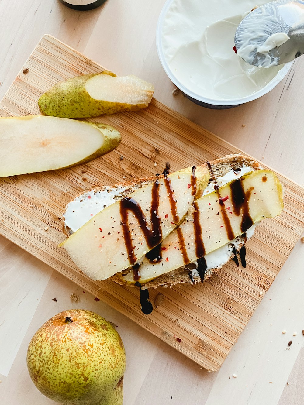 sliced bread on brown wooden chopping board