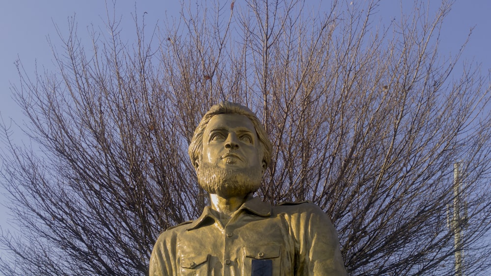 man in black leather jacket statue