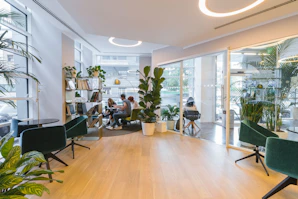 modern lounge interior with plants and chairs