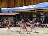Local cultural performance showcasing traditional costumes and dances in the mountain village