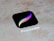 A digital icon with a black background, featuring a multicolored stylized feather. Below the icon, the text 'Procreate' is visible.