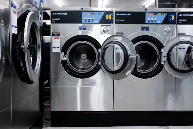 White front-load washing machine similar to LG models we repair in Somerville
