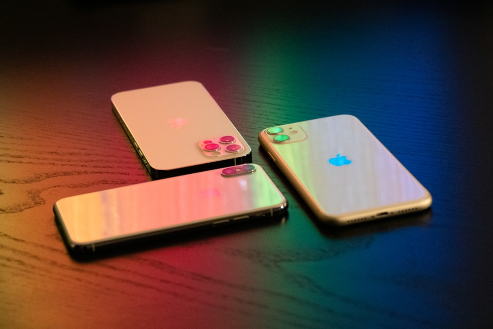 silver ipad on brown wooden table