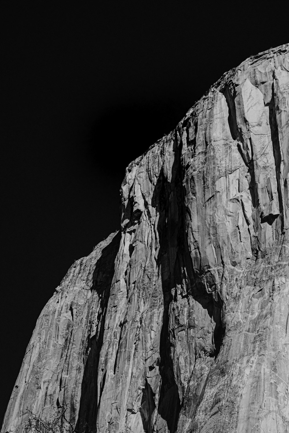 grayscale photo of rocky mountain