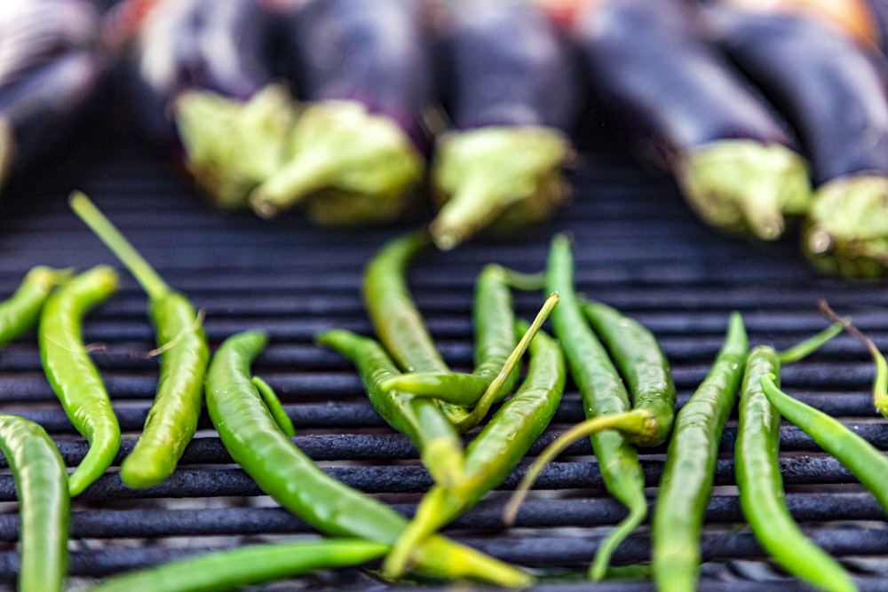 green chili on black wooden table