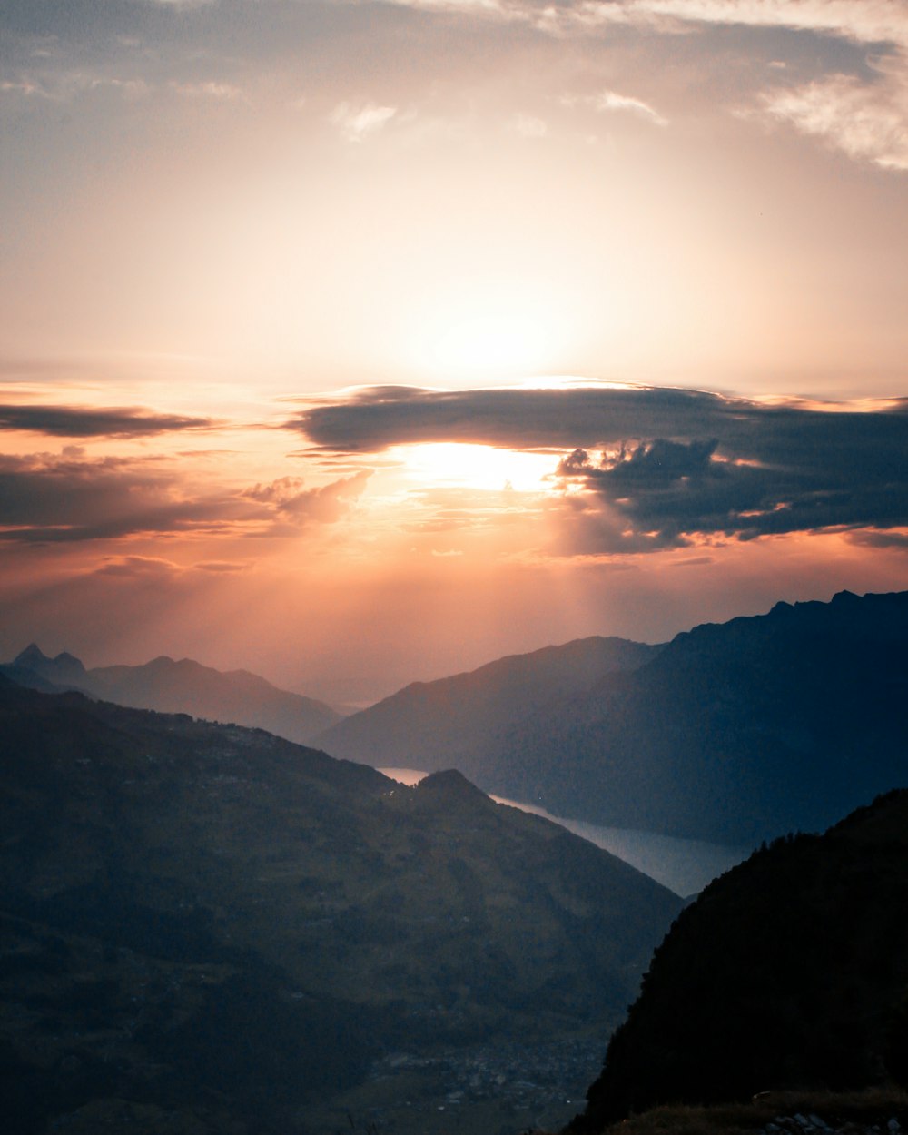 silhouette of mountains during sunset