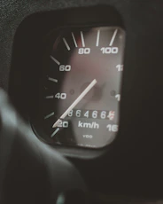 black and white analog speedometer