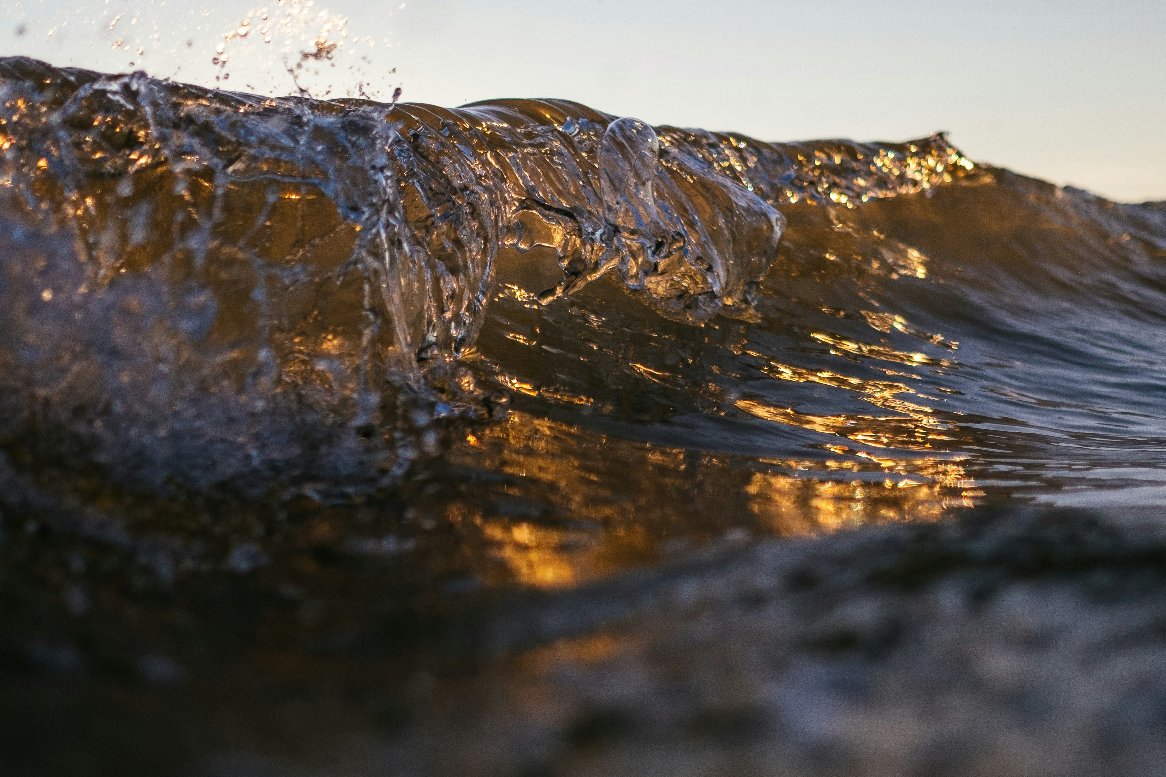 water splash on brown rock