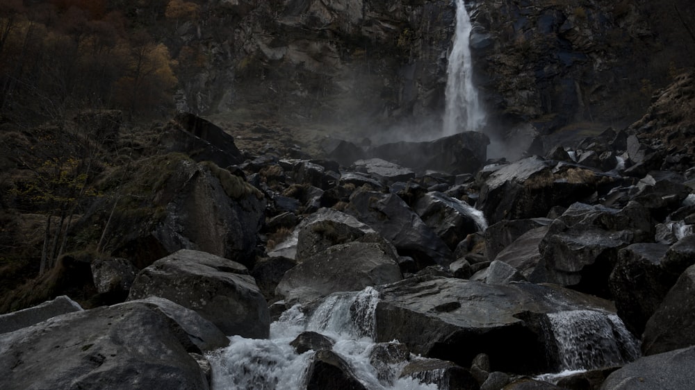 water falls on rocky mountain