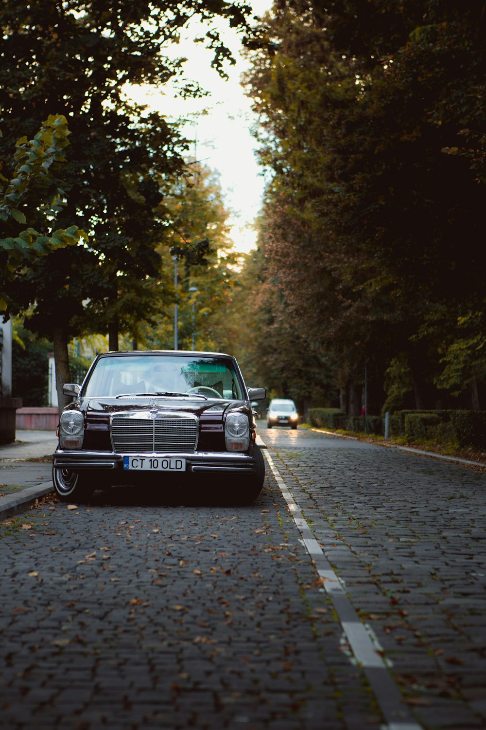 black car on road during daytime