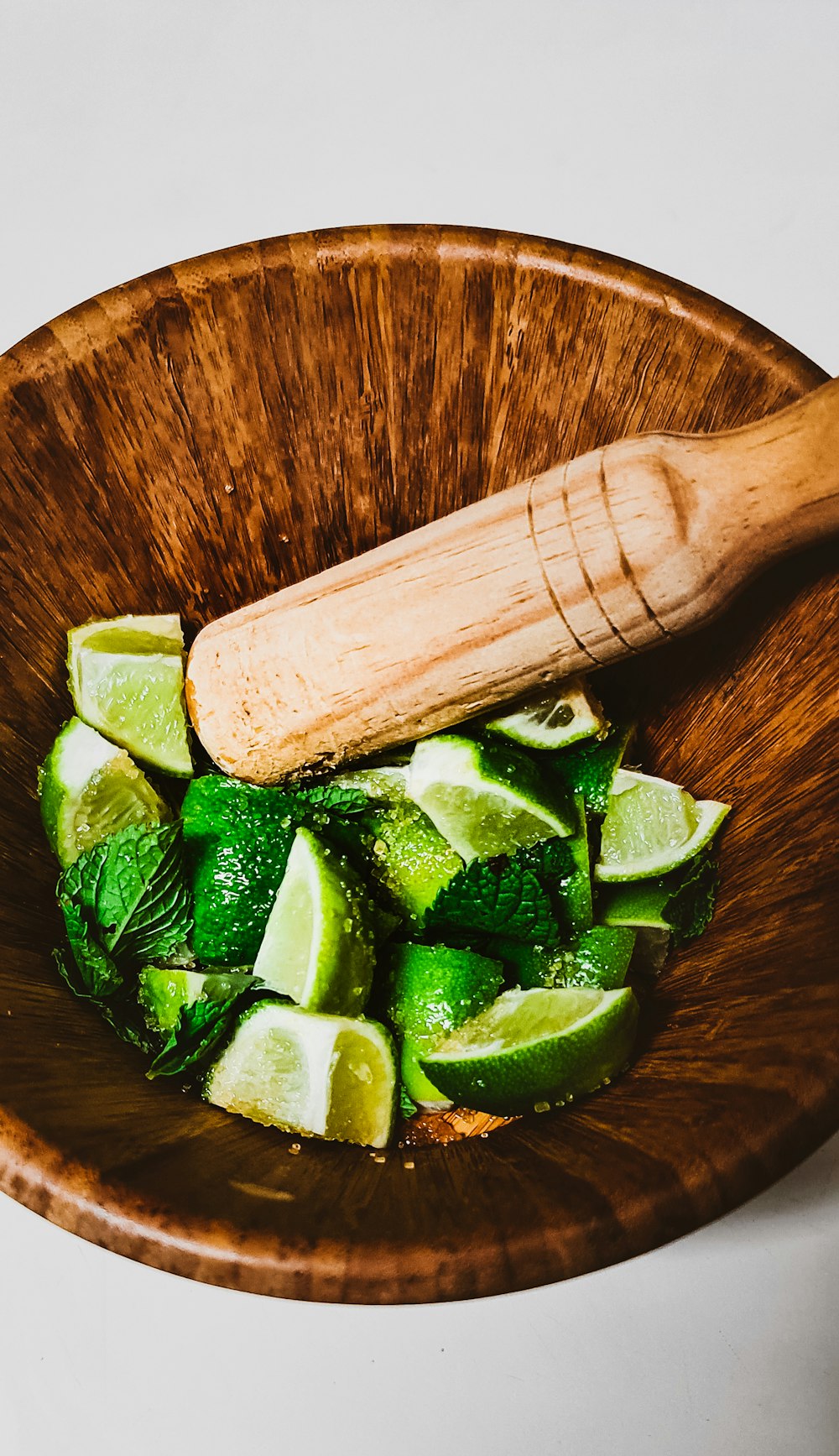 sliced cucumber on brown wooden chopping board