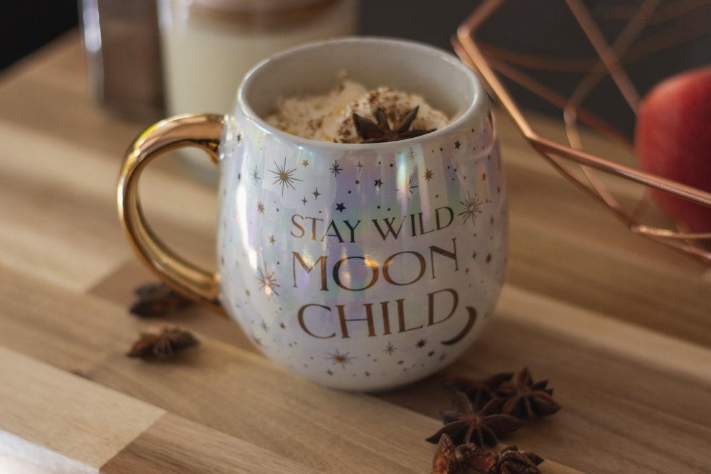 white ceramic mug with coffee