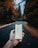 person holding white iphone 5 c