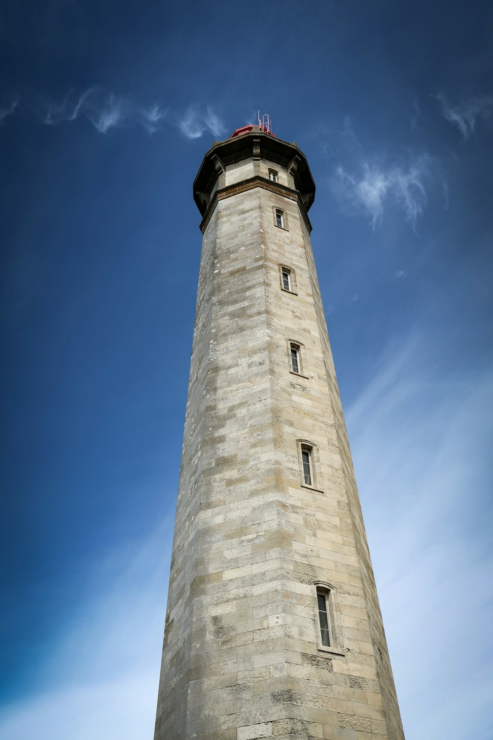 gray concrete tower under blue sky during daytime