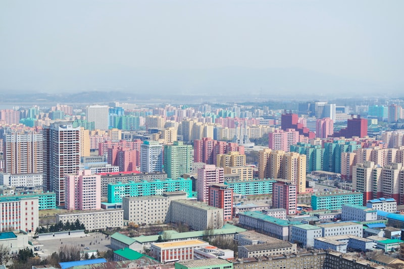 Pyongyang skyline, North Korea architecture, political conference hall, Korean flag, assembly hall