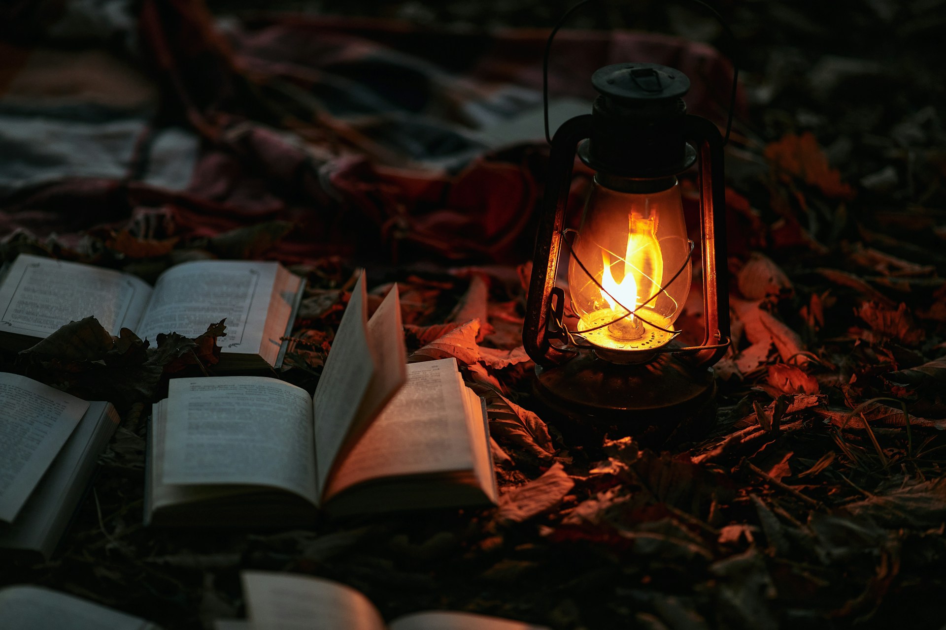 brown and black lantern on brown wooden table