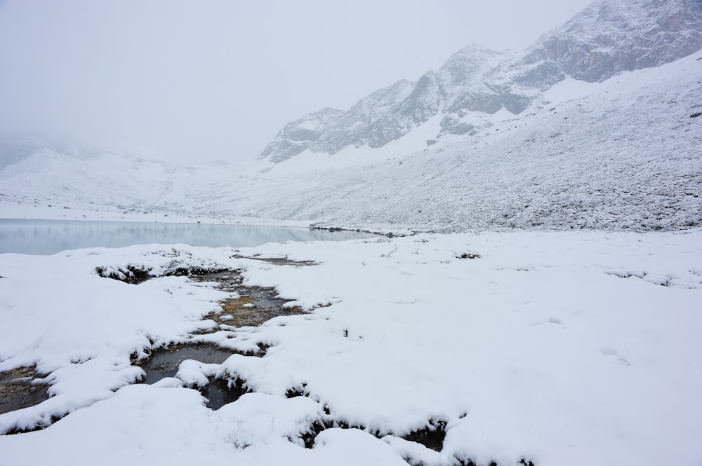 snow covered mountain during daytime