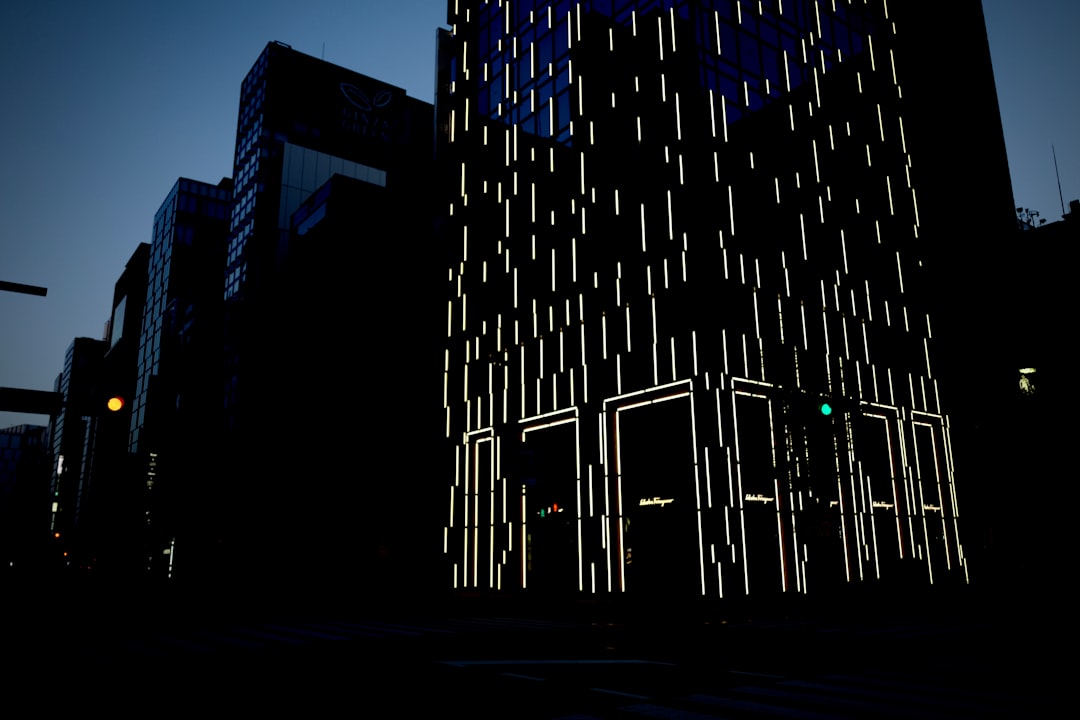 blue and black building during night time