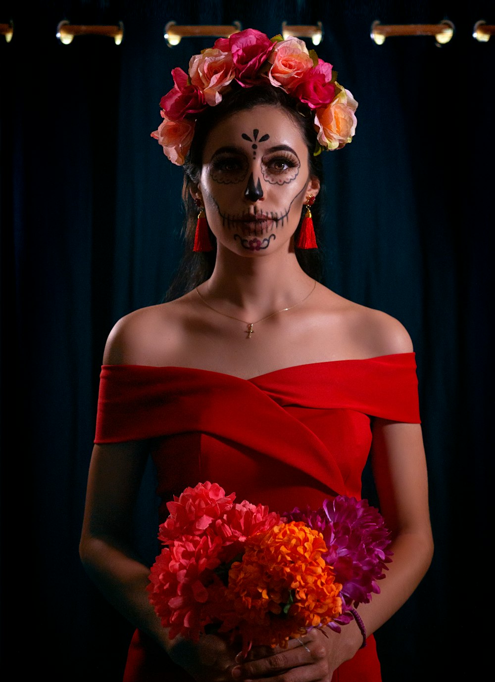 woman in red dress with flower crown