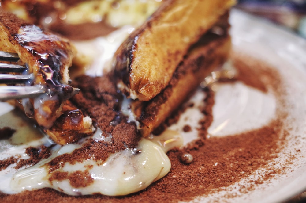 brown and white pastry on white ceramic plate