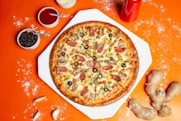 pizza with cheese and green leaf
