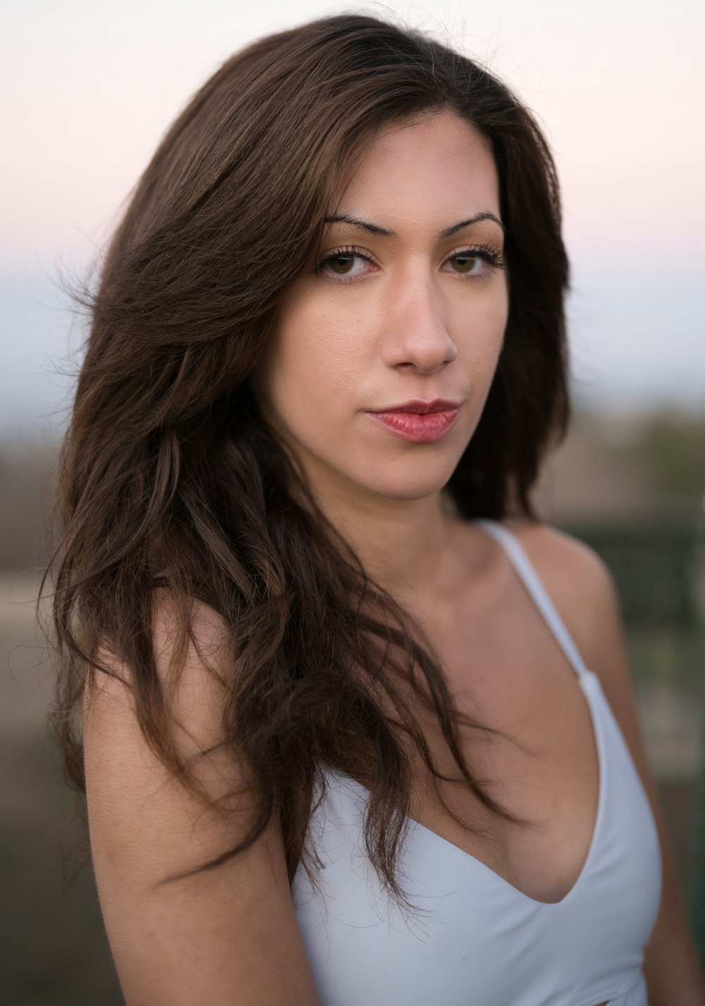 woman in white tank top