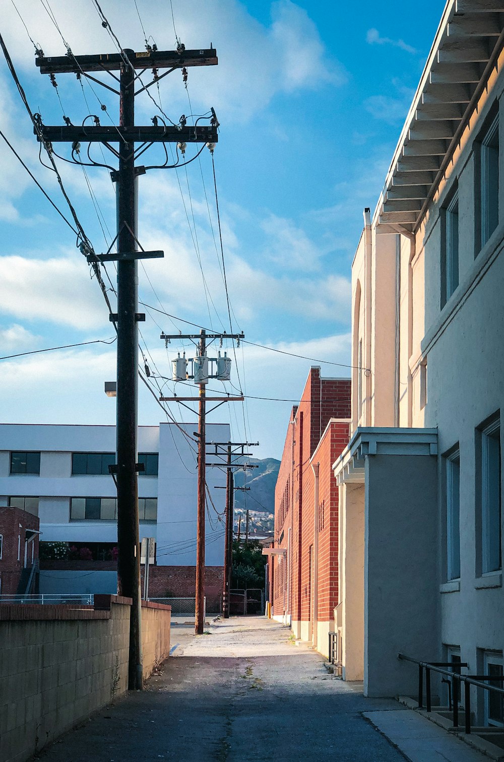 white and brown concrete building under blue sky during daytime