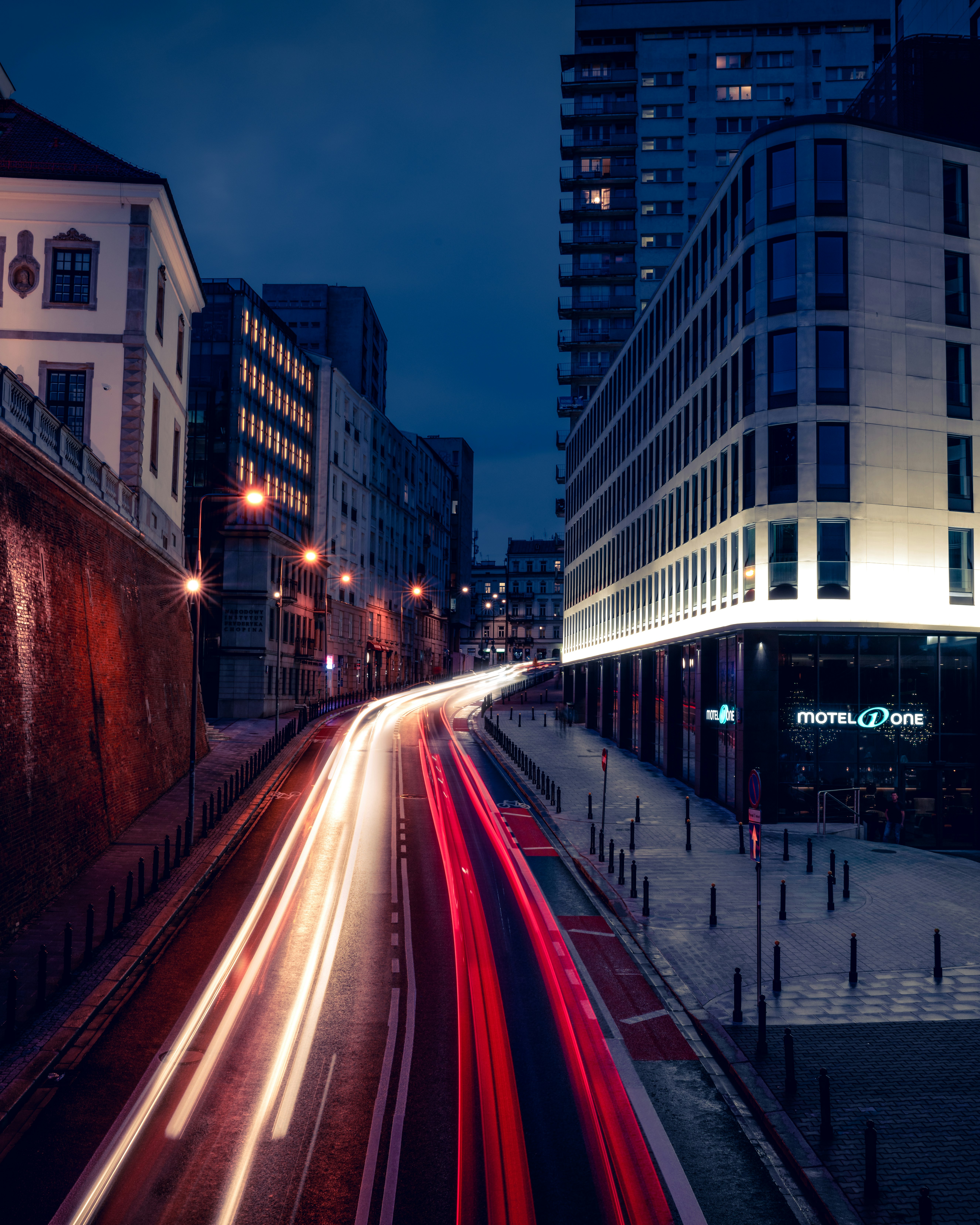 time lapse photography of cars on road during night time