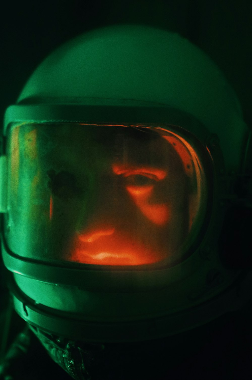 person wearing green helmet and goggles