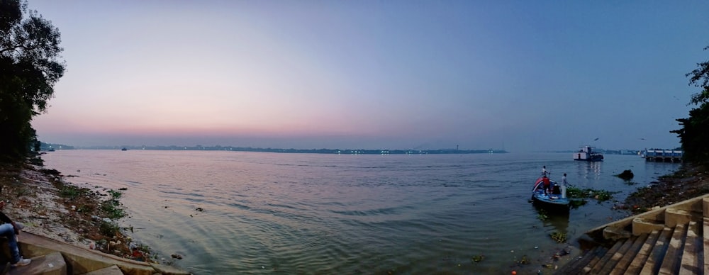 body of water under blue sky during daytime