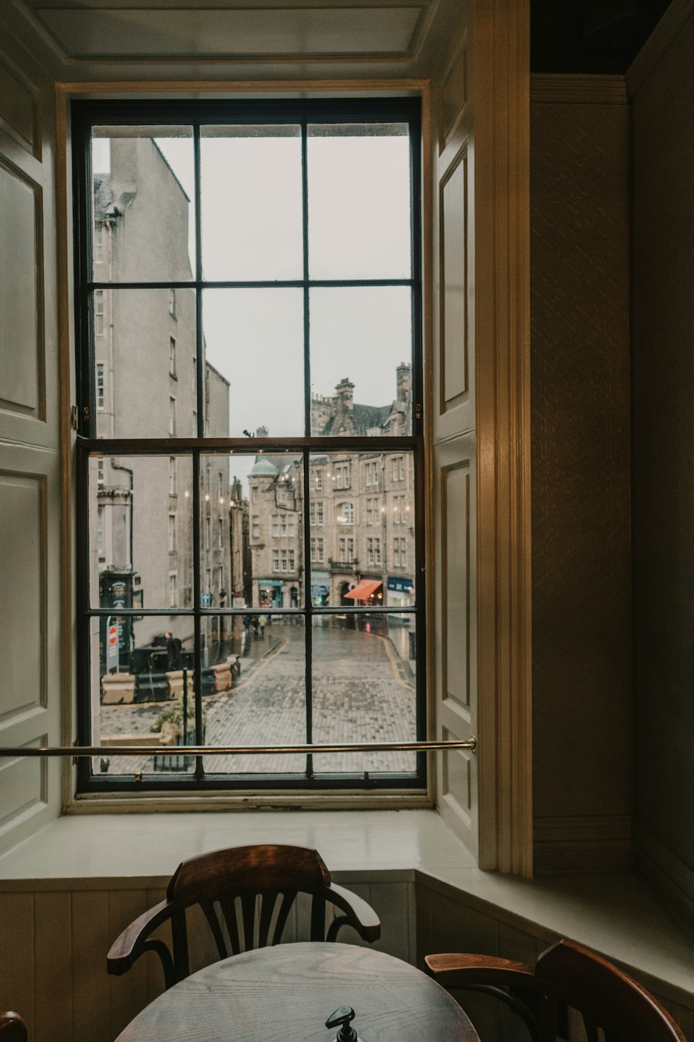 white wooden framed glass window