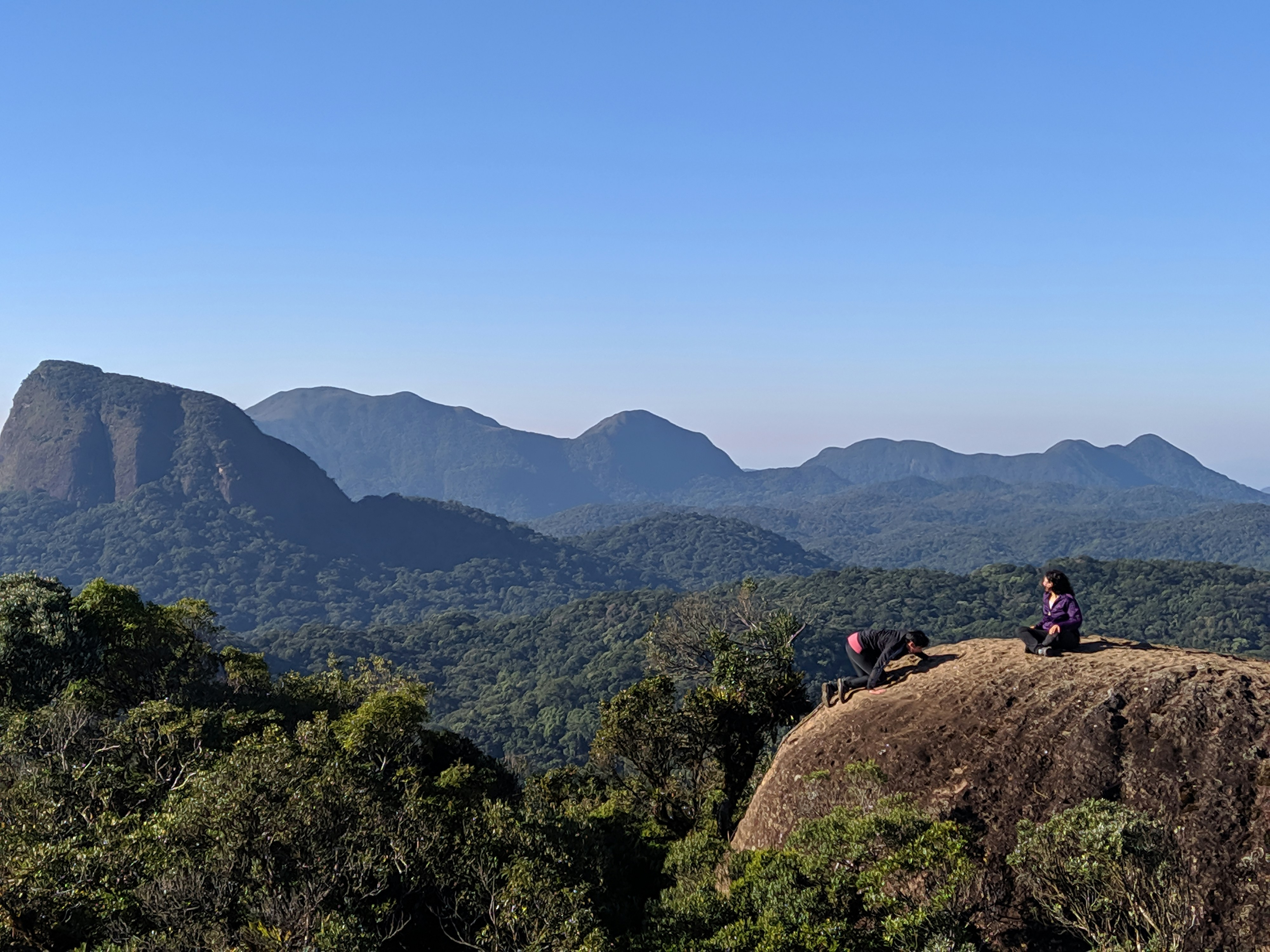 Tourists enjoying a peaceful visit in Bichanakandi’s rocky landscapes