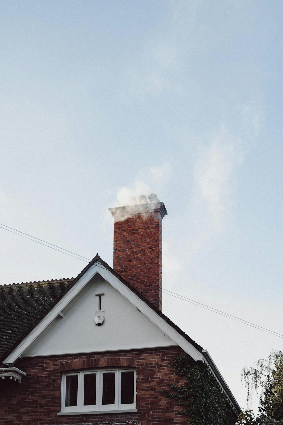 brown-and-white-concrete-house-under-white-sky-during-daytime-k8YvyMzI200 collection background image