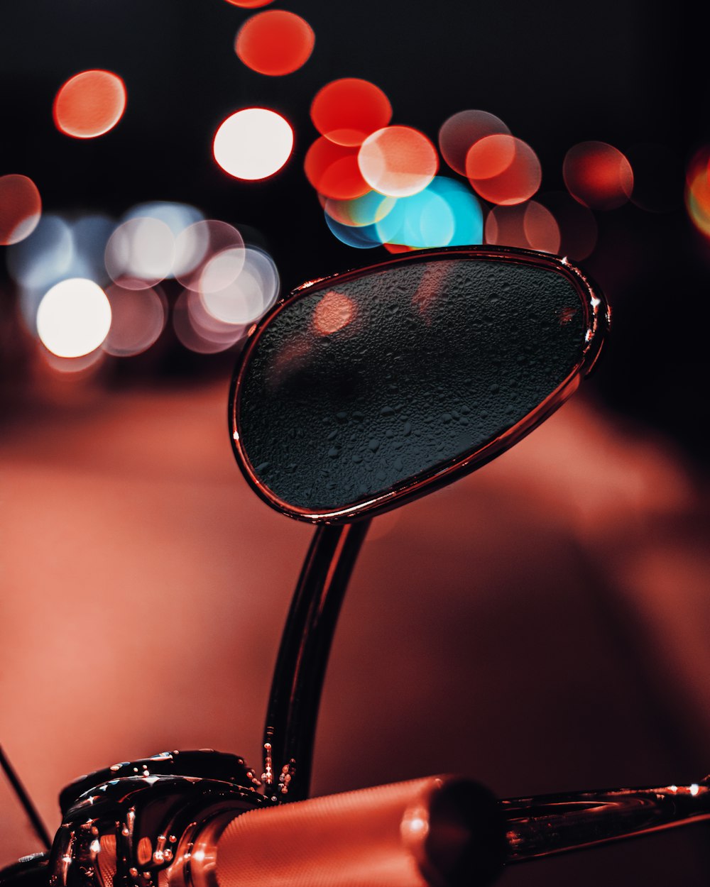 black magnifying glass with bokeh lights