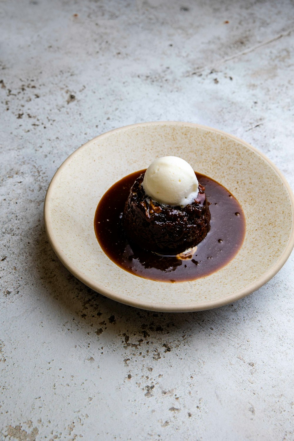 chocolate cake on white ceramic plate