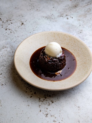 chocolate cake on white ceramic plate