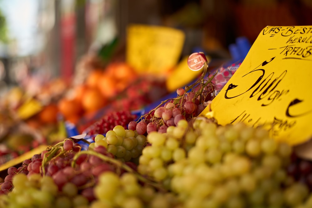 red and green grapes on display