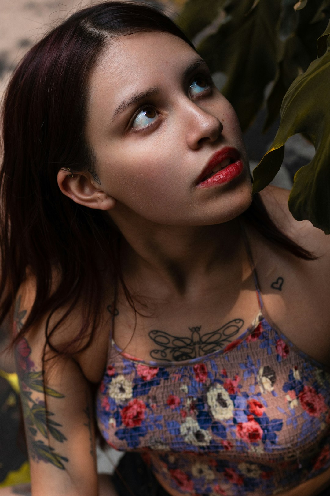 woman in white red and blue floral tank top