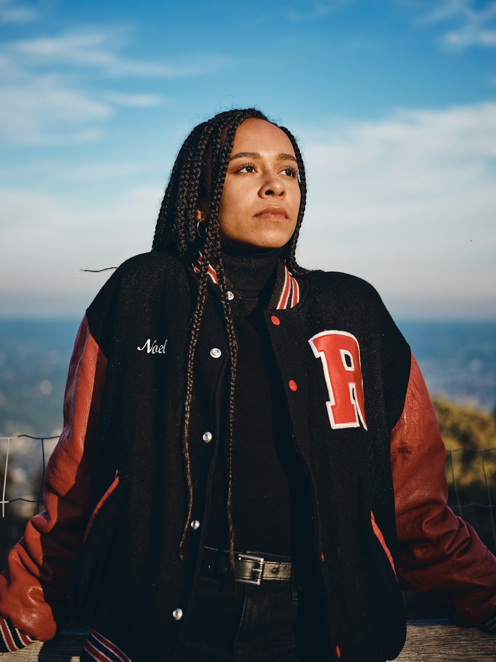 woman in black and red zip up hoodie