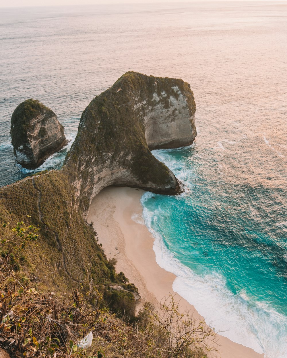 brown rock formation on seashore during daytime