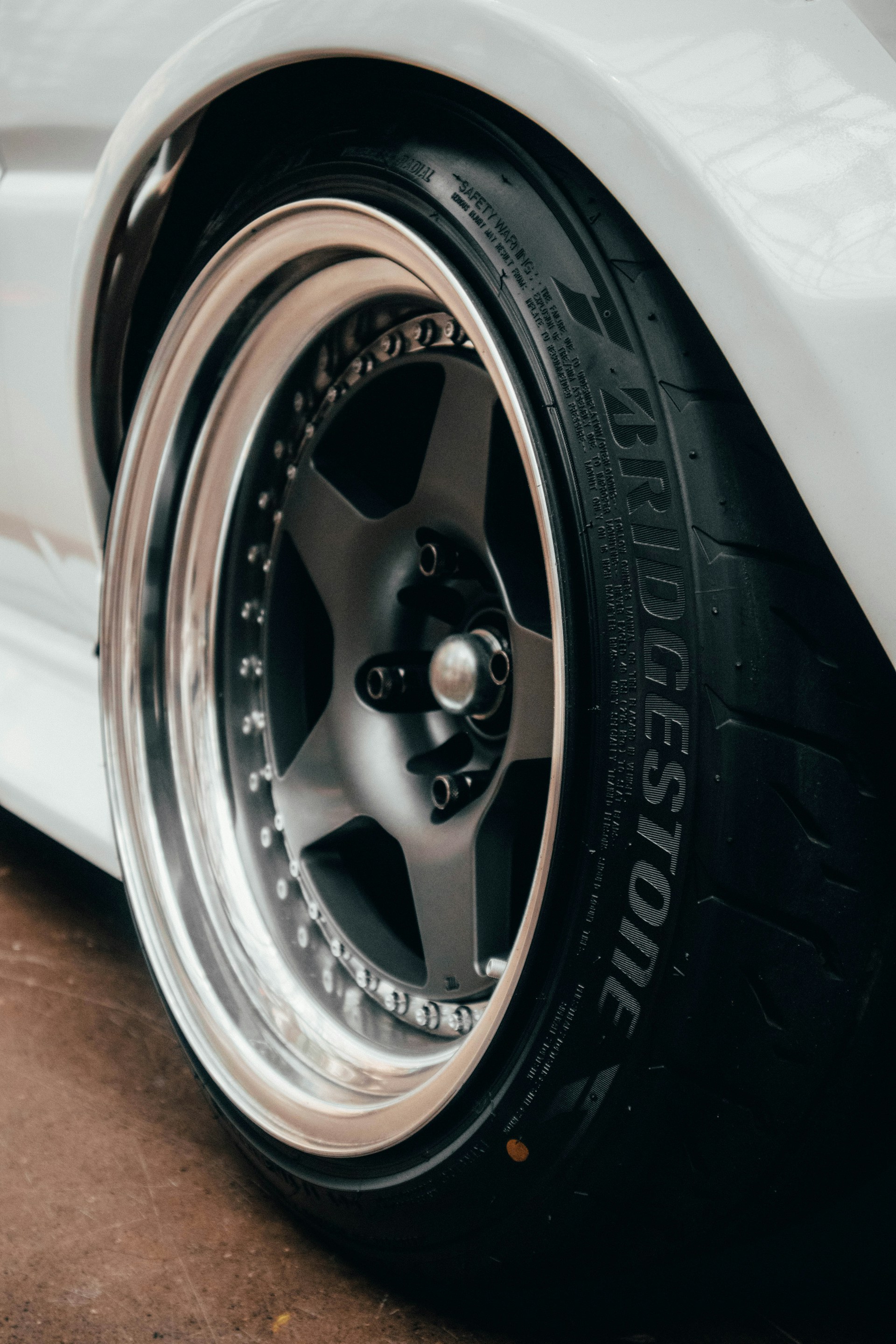 silver car wheel with tire