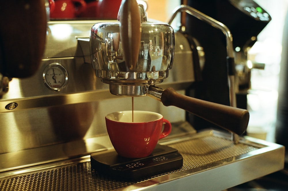 silver and black espresso machine