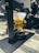 A customer receiving their drink from the Brew Kiosk.