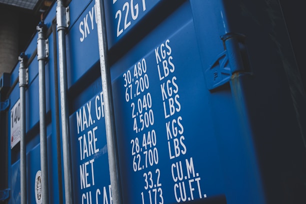 Close-up of a shipment of goods being inspected carefully before transport.