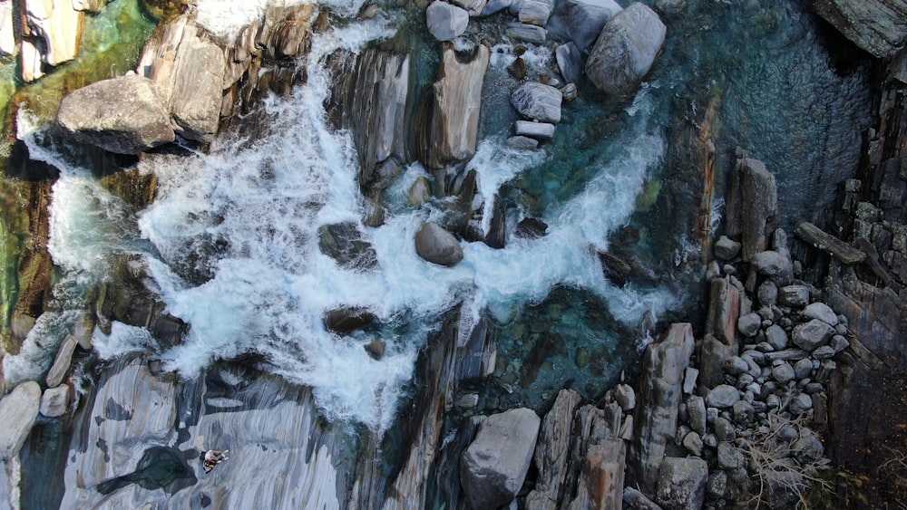 water falls on rocky mountain