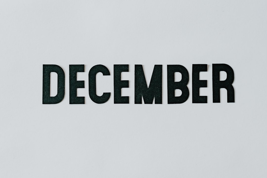 text, Black paper word December