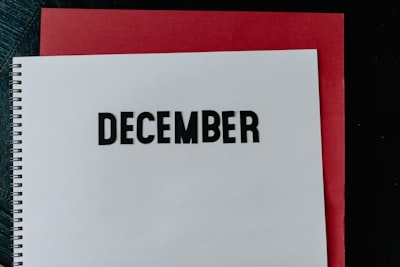 white and red box on red textile december 25 teams background