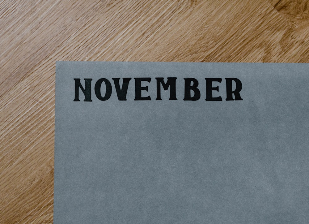 a piece of paper that says november on it