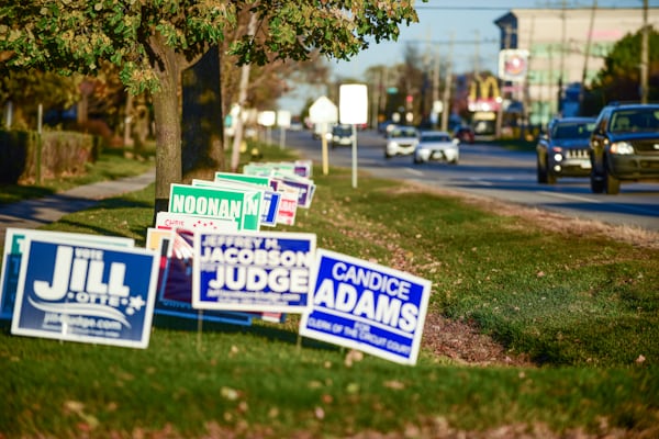 Yard signs advertising a local business